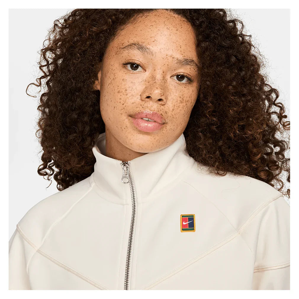 Women`s Court Dri-FIT Heritage Windrunner Poly Knit Jacket Pale Ivory NIKE