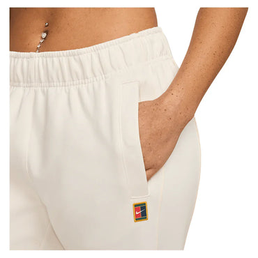 Women`s Court Dri-FIT Heritage Windrunner Poly Knit Pant Pale Ivory NIKE